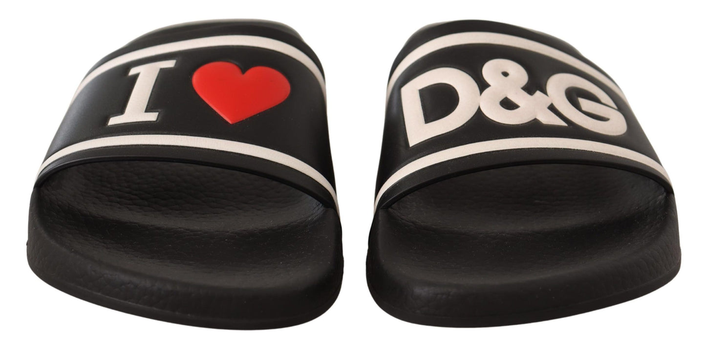 Dolce & Gabbana Элегантные черные кожаные шлепанцы для нее