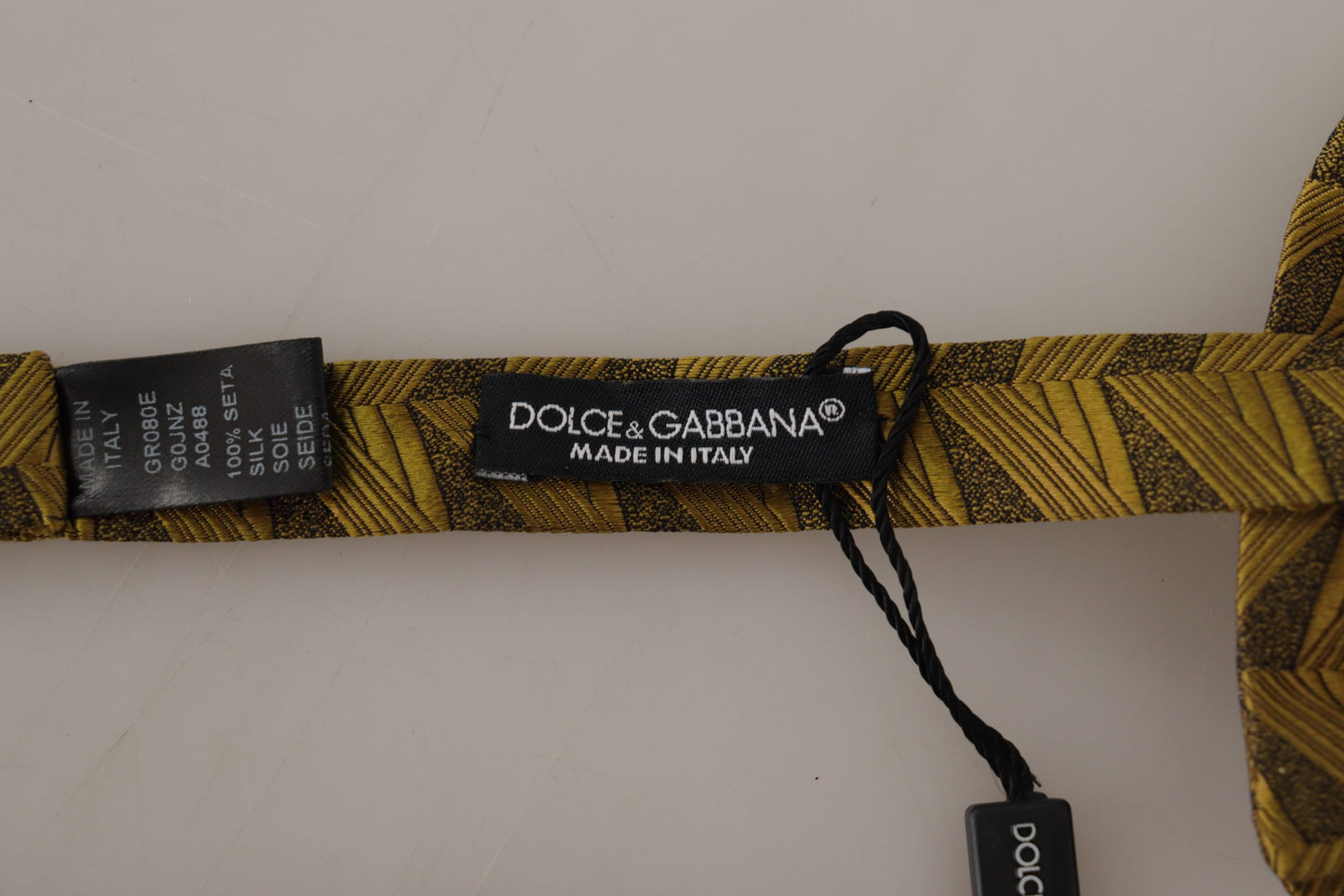 Элегантный золотой шелковый галстук-бабочка Dolce & Gabbana
