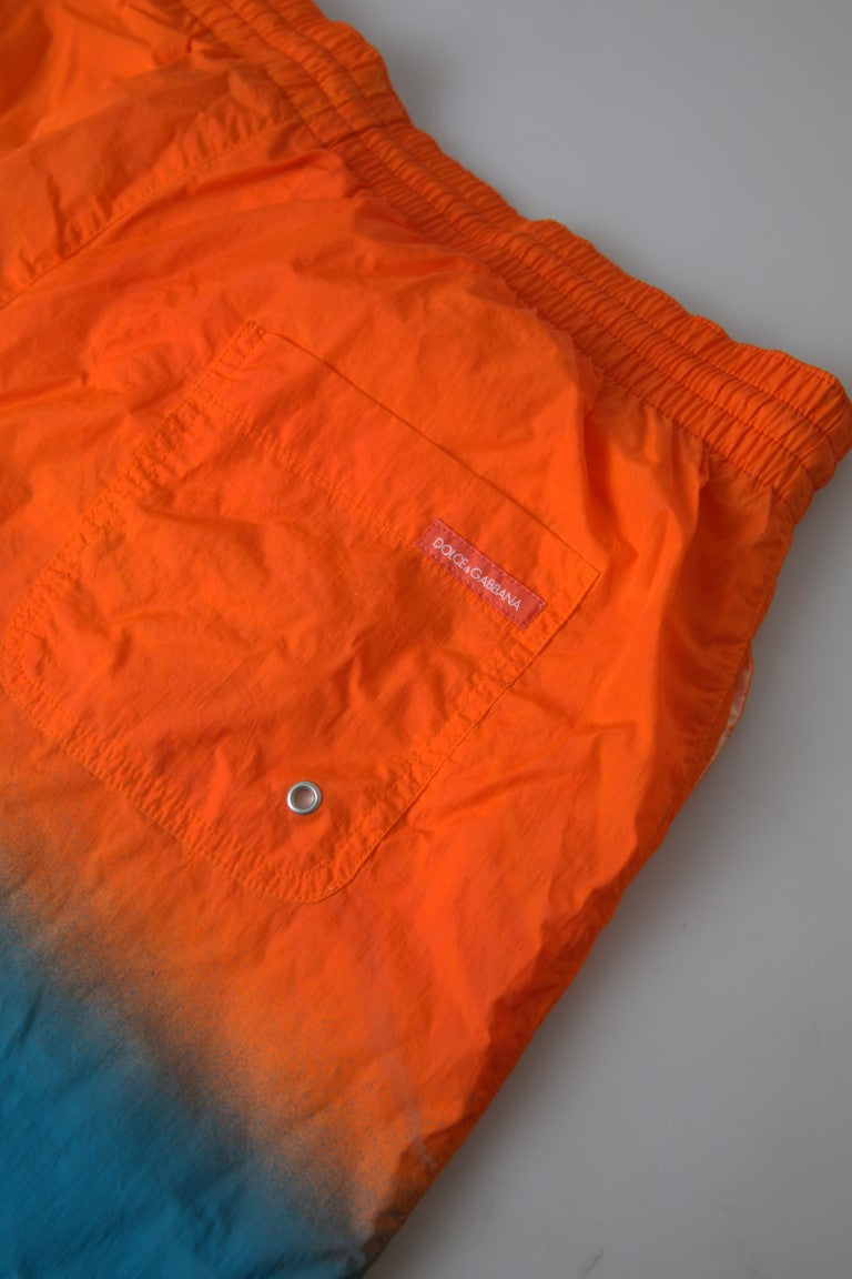 Pantaloncini da bagno effetto sfumato Dolce & Gabbana in arancione vibrante