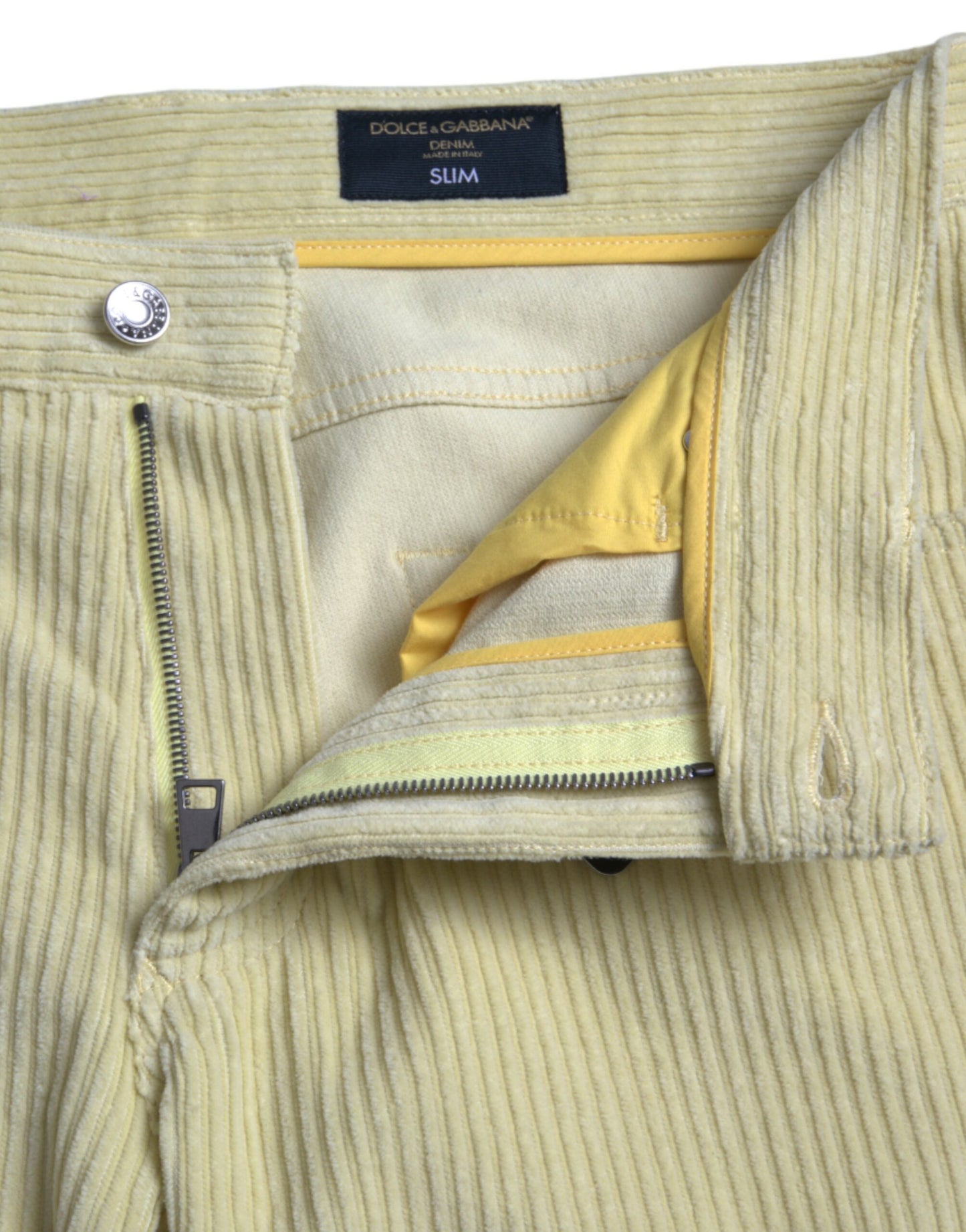 Jeans skinny in denim skinny con placca con logo in velluto a coste giallo Dolce & Gabbana