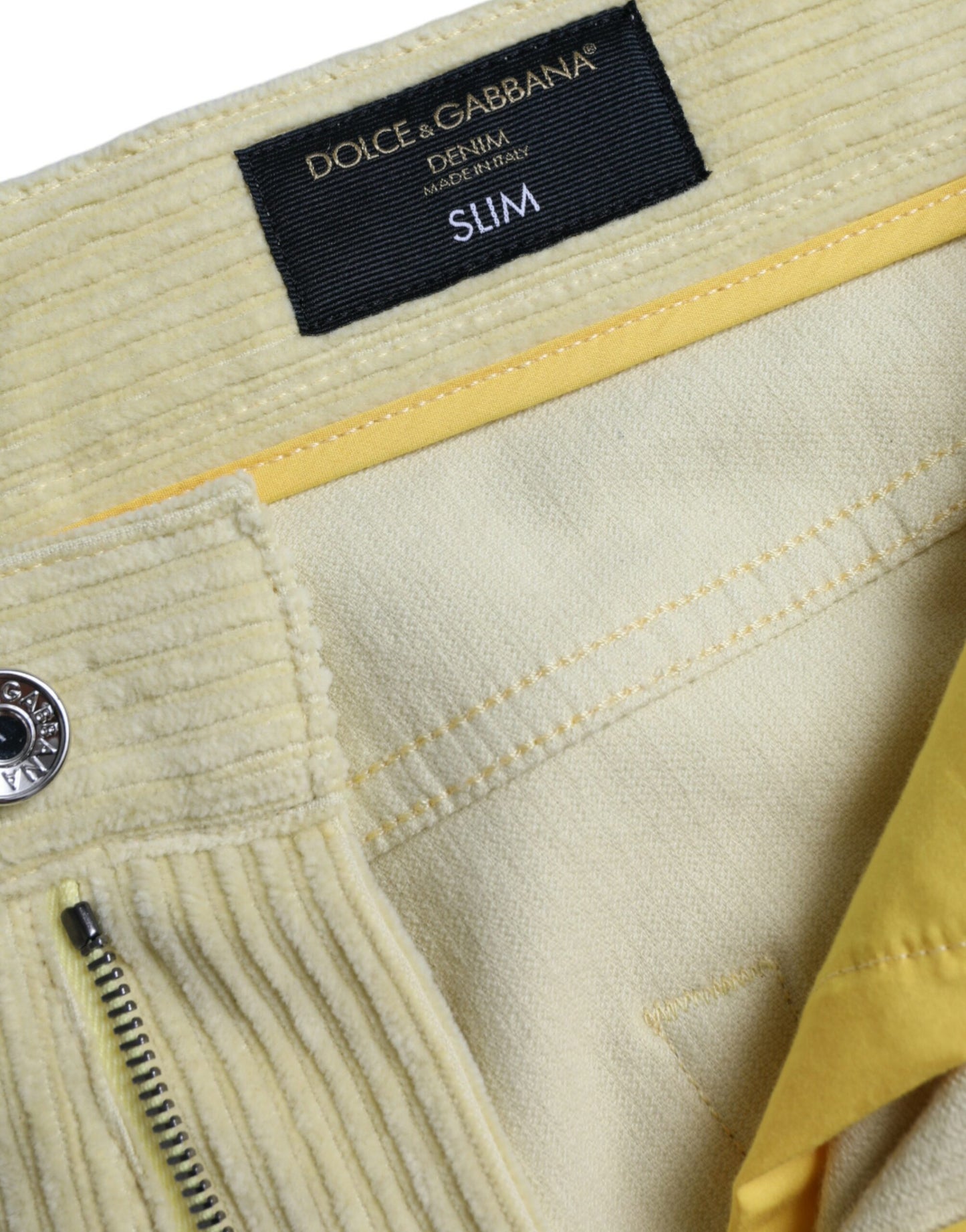 Jeans skinny in denim skinny con placca con logo in velluto a coste giallo Dolce & Gabbana
