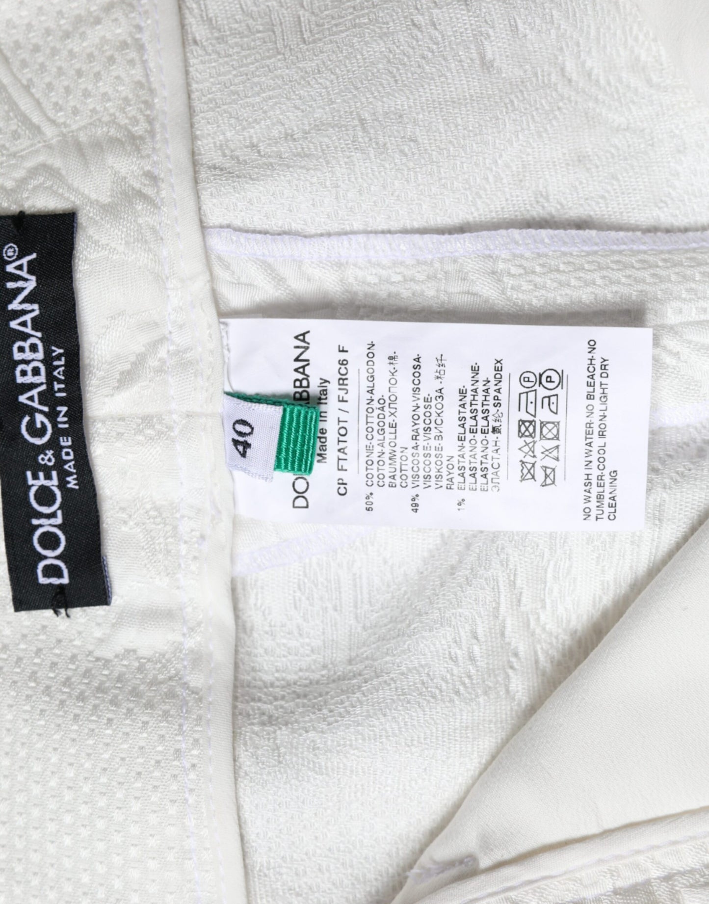 Pantaloni corti in broccato di cotone floreale bianco Dolce & Gabbana