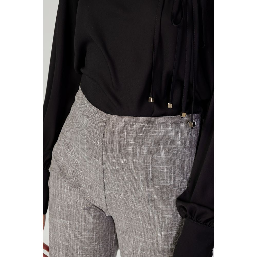 Jeans e pantaloni in poliestere grigio Sandro Ferrone