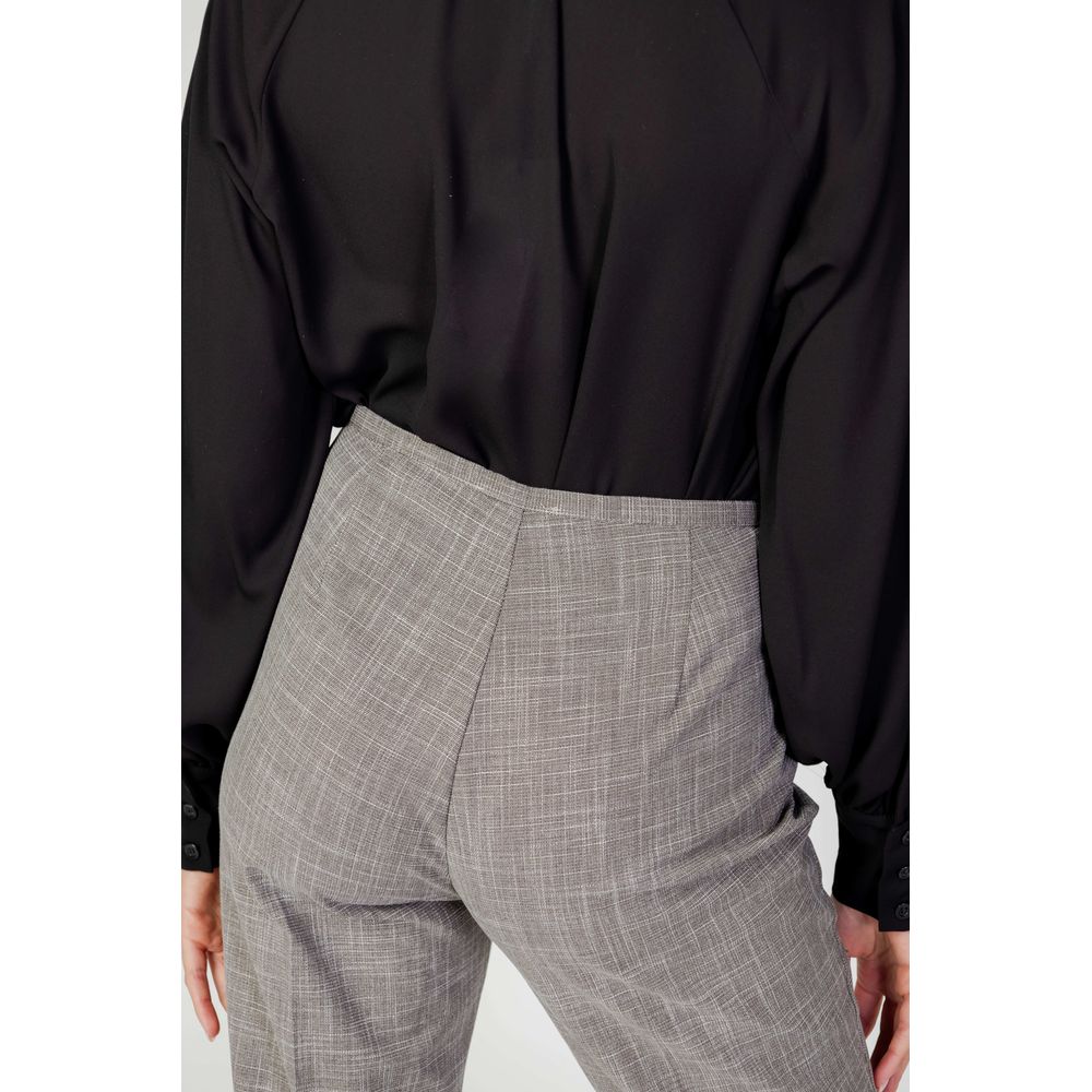 Jeans e pantaloni in poliestere grigio Sandro Ferrone