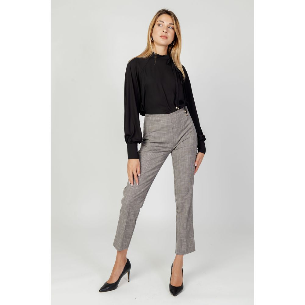 Jeans e pantaloni in poliestere grigio Sandro Ferrone
