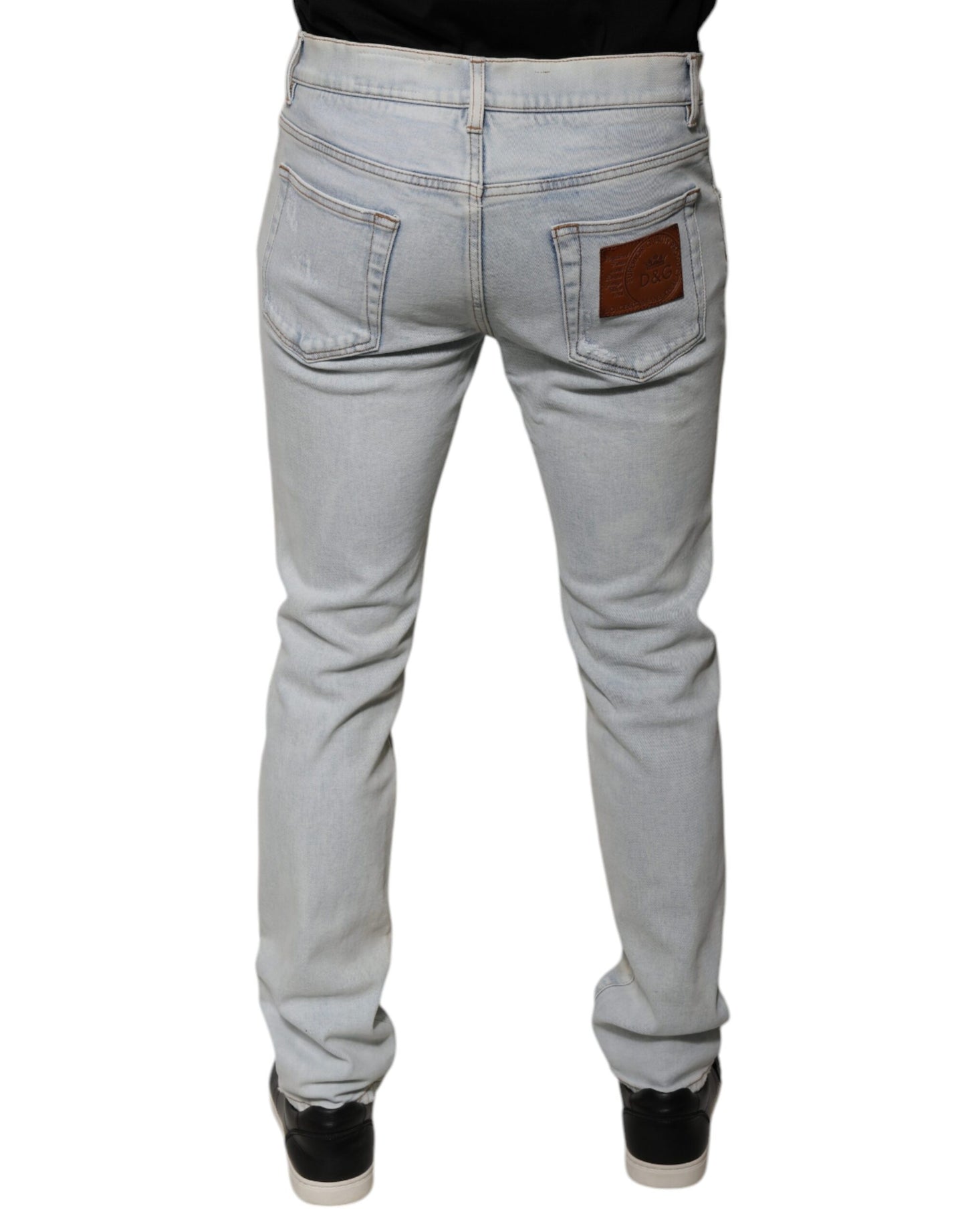 Jeans aderenti in denim strappato in misto cotone azzurro chiaro Dolce & Gabbana