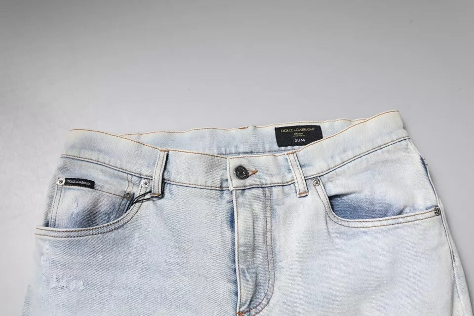Jeans aderenti in denim strappato in misto cotone azzurro chiaro Dolce & Gabbana