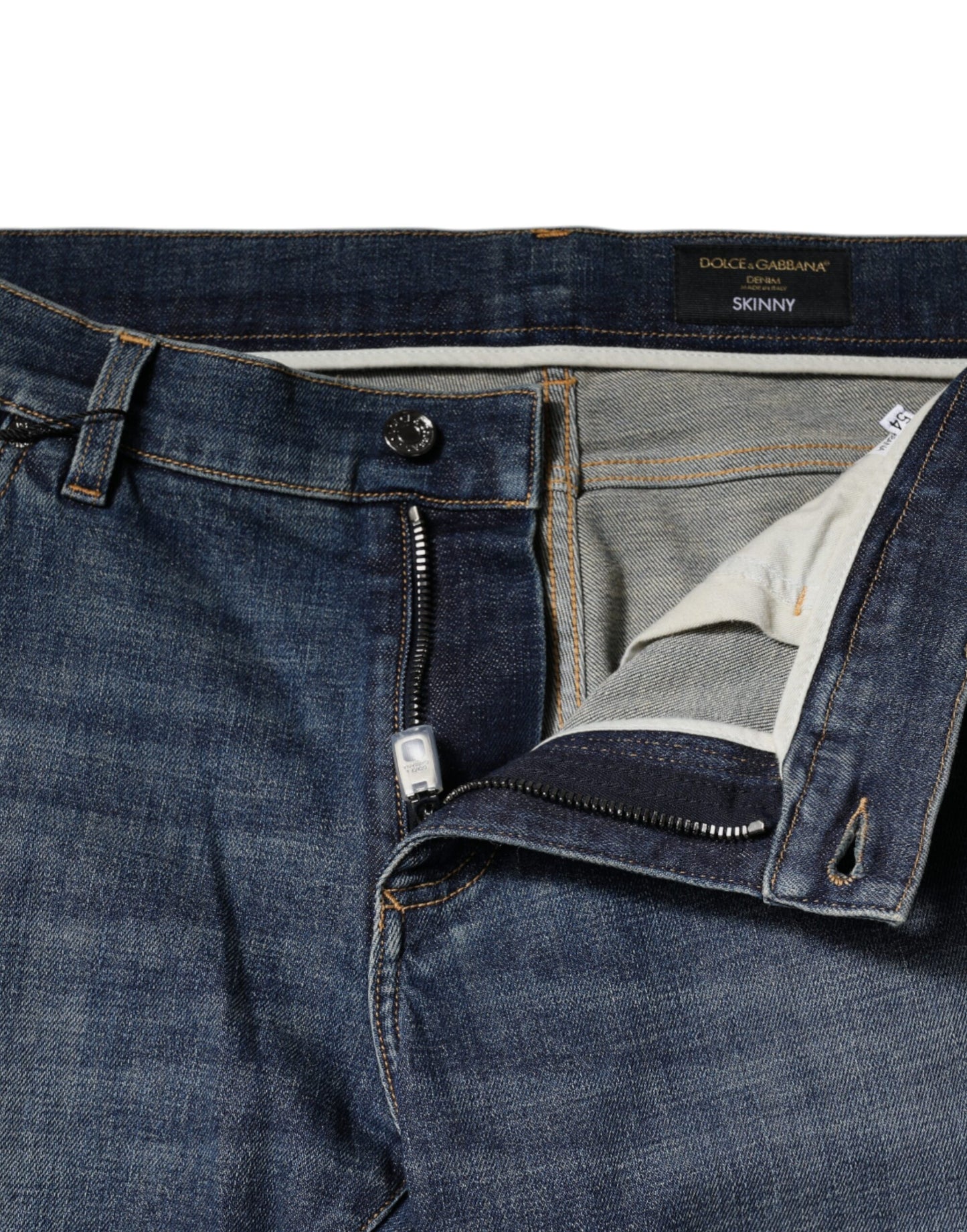 Jeans aderenti in denim di cotone con placca logo blu Dolce & Gabbana