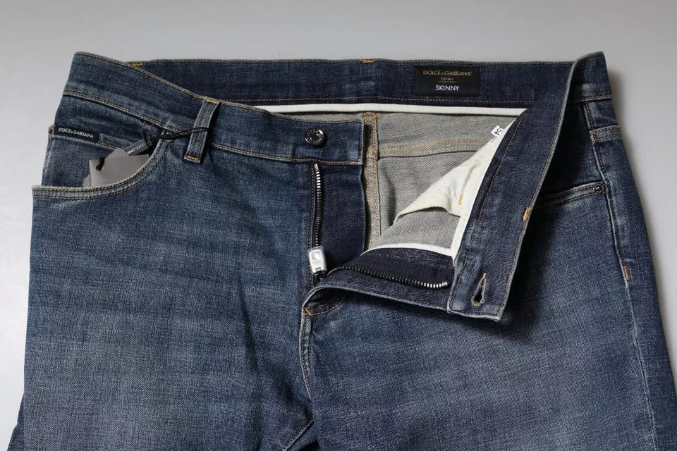 Jeans aderenti in denim di cotone con placca logo blu Dolce & Gabbana