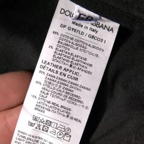 Jeans aderenti in denim di cotone con logo strappato nero Dolce & Gabbana