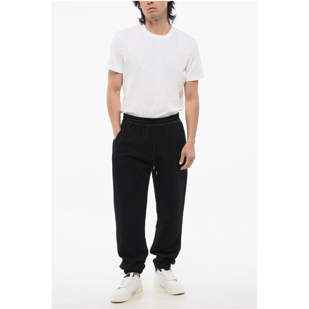Saint Laurent Cuffed Fleeced Cotton Sweatpants with Nylon Detail