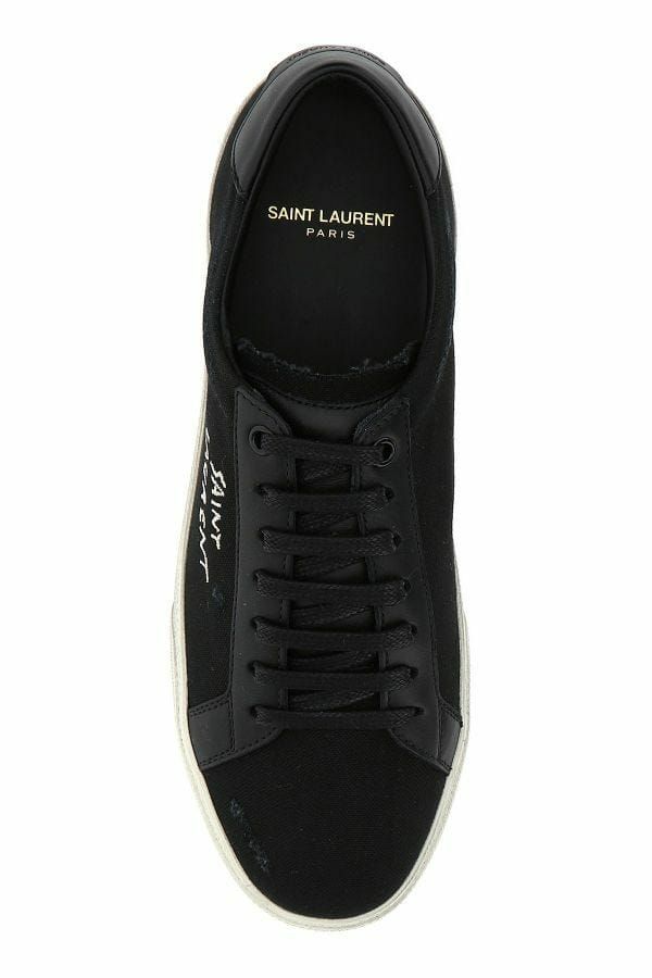 Saint Laurent Eleganti sneakers basse in tela e pelle nere