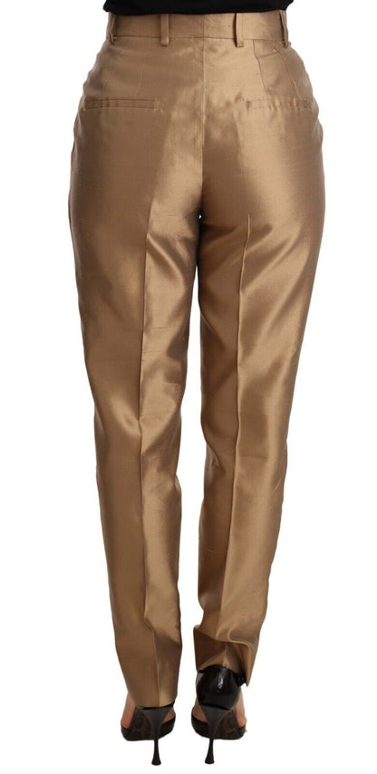 Dolce & Gabbana Elegant Tapered Silk Trousers in Gold