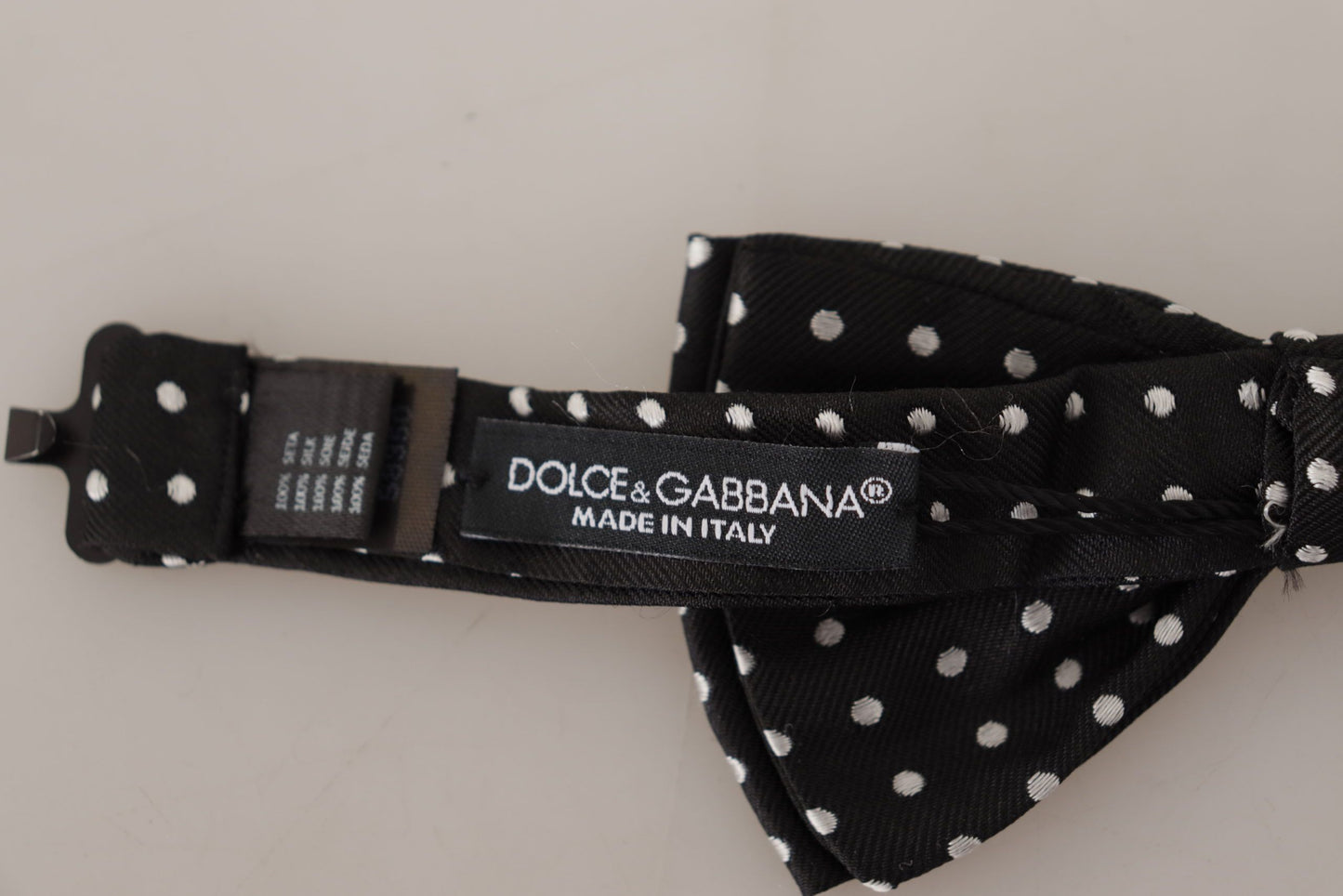 Dolce &amp; Gabbana Элегантный черно-белый шелковый галстук-бабочка в горошек