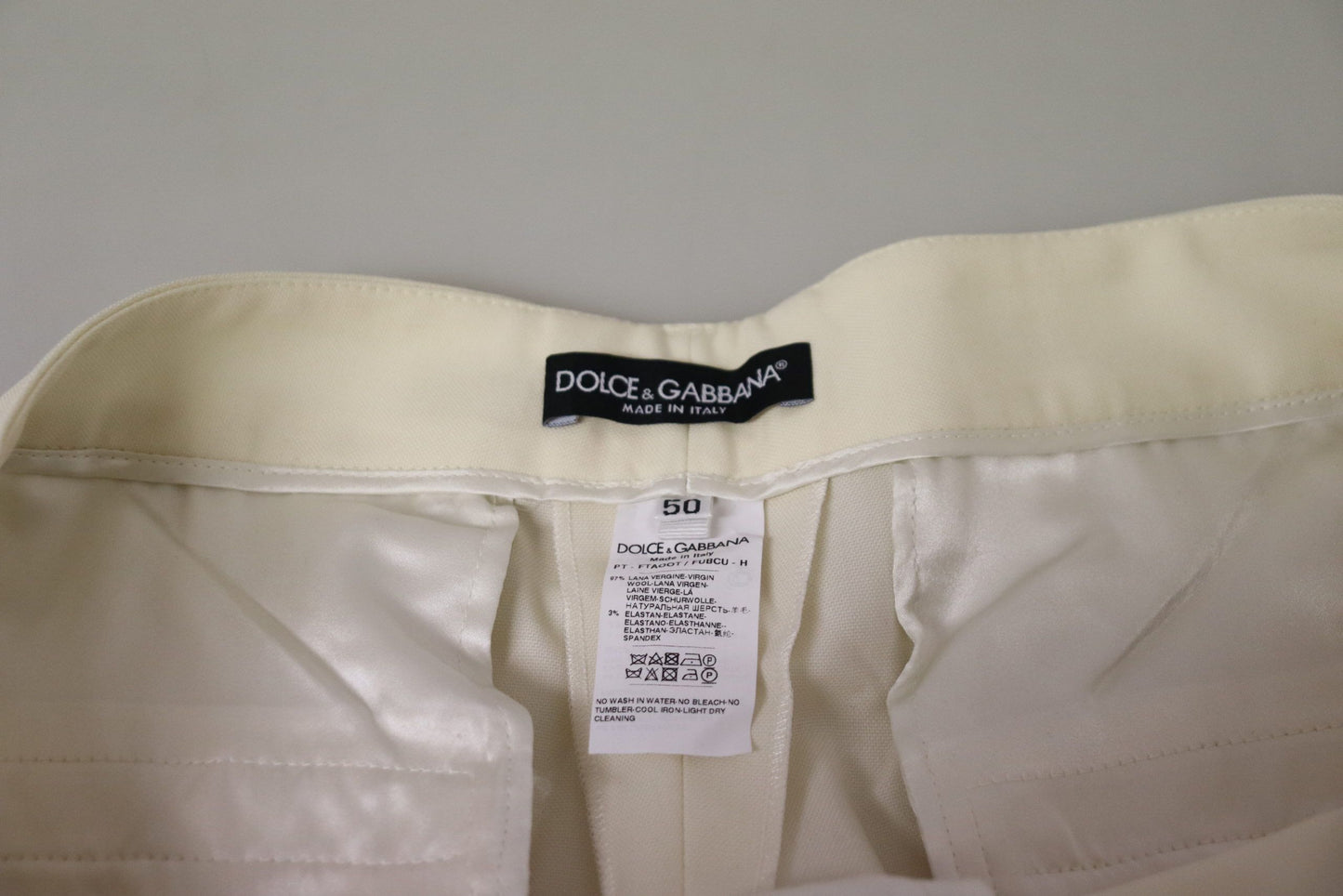 Dolce &amp; Gabbana Pantaloni eleganti in lana a vita alta color avorio