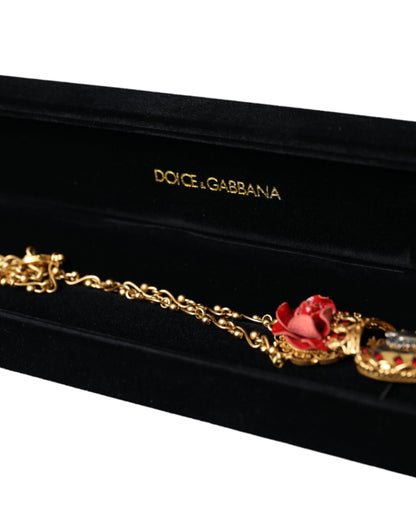 Dolce &amp; Gabbana Collana con ciondolo in ottone dorato con cuore sacro e cristalli rosa