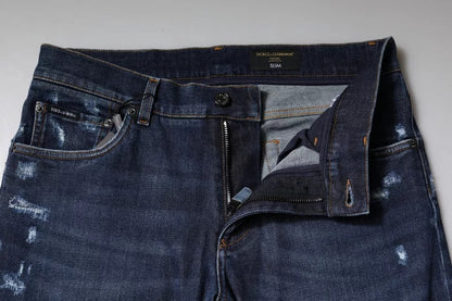 Jeans slim fit in denim con stampa logo in cotone blu Dolce &amp; Gabbana