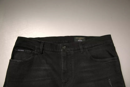 Jeans aderenti in denim di cotone con logo strappato nero Dolce &amp; Gabbana