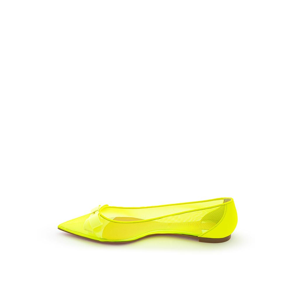 Christian Louboutin radiante maglia gialla appartamenti