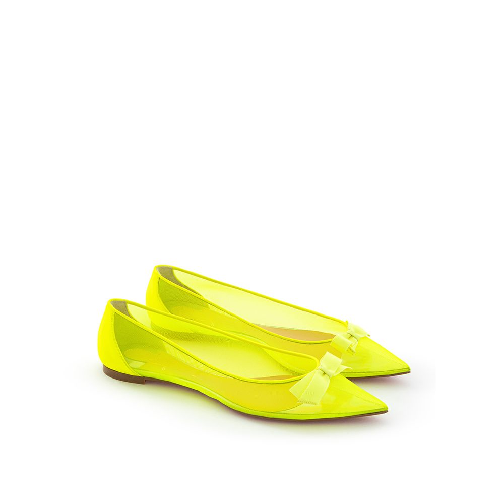 Christian Louboutin radiante maglia gialla appartamenti