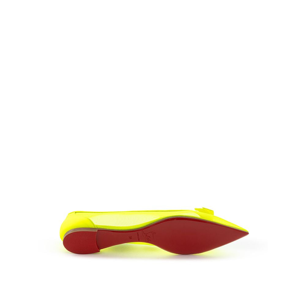 Christian Louboutin radiante maglia gialla appartamenti