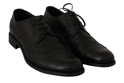 Dolce &amp; Gabbana eleganti scarpe derby con punta alari in pelle nera