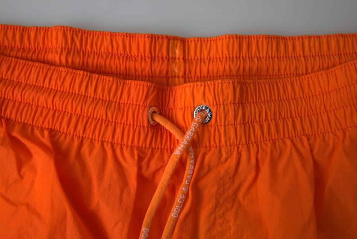 Dolce & Gabbana Gradient Effect Swim Shorts in Vibrant Orange - PER.FASHION