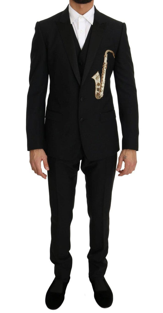 Dolce &amp; Gabbana Abito elegante nero a tre pezzi con ricamo sassofono